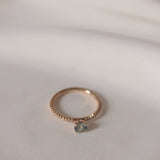 Start Bidding: Mini Elise Ring with Diamond and Olive Green Sapphires
