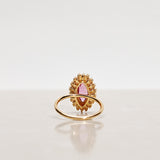 One-of-a-Kind Marquise Ring with a Unique Madagascar Sapphire and a Halo of Yellow Sapphires and Diamonds