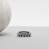 Finished: Idun Curved Diamond Band in White Gold with Black and White Diamonds